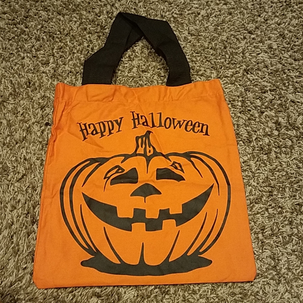 Kids happy Halloween candy treat bag.